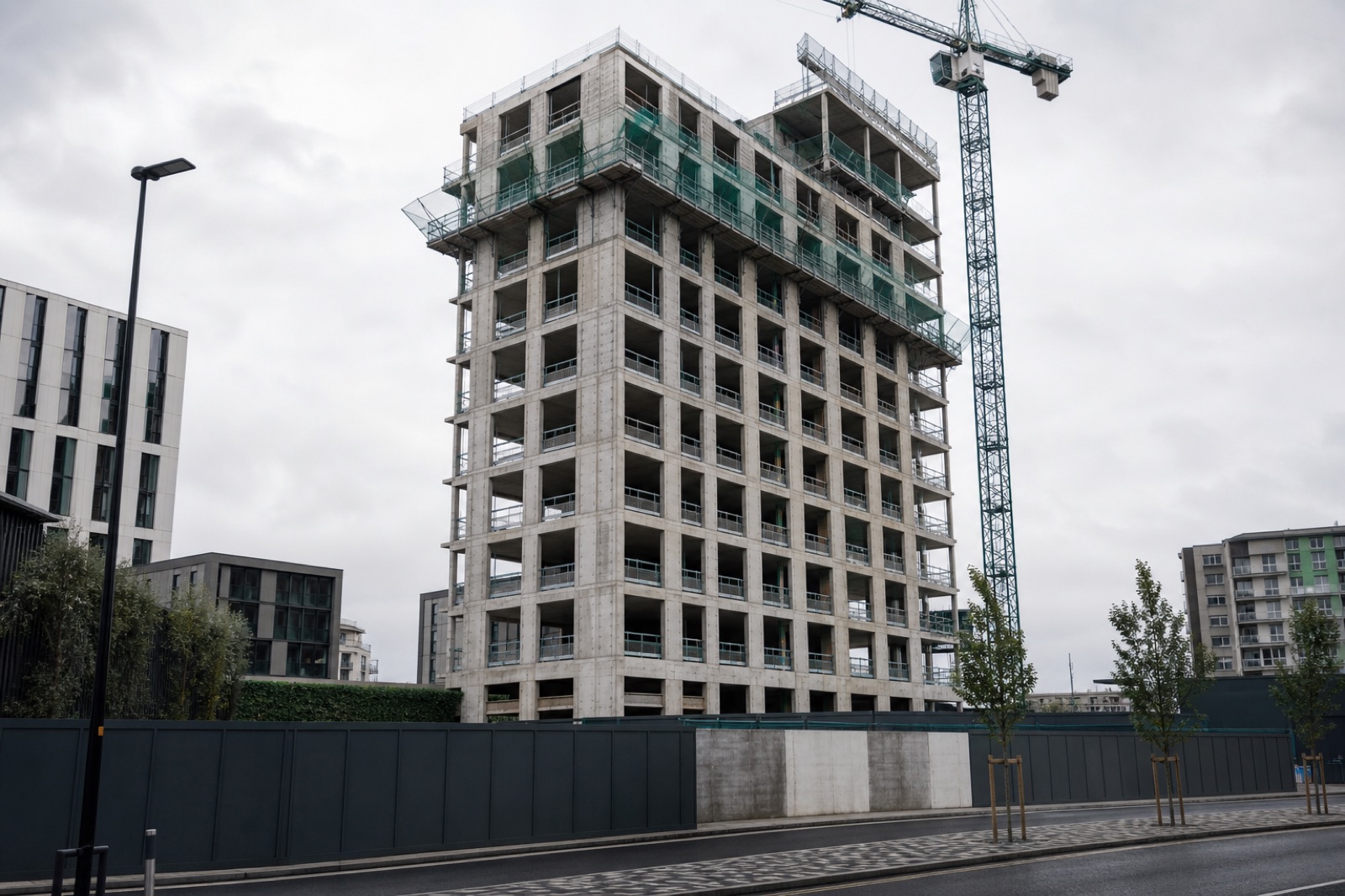 A student accommodation frame under construction with a tower crane